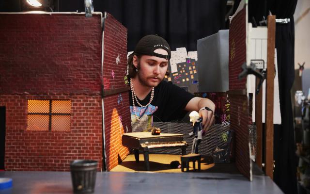 PSU student working on model